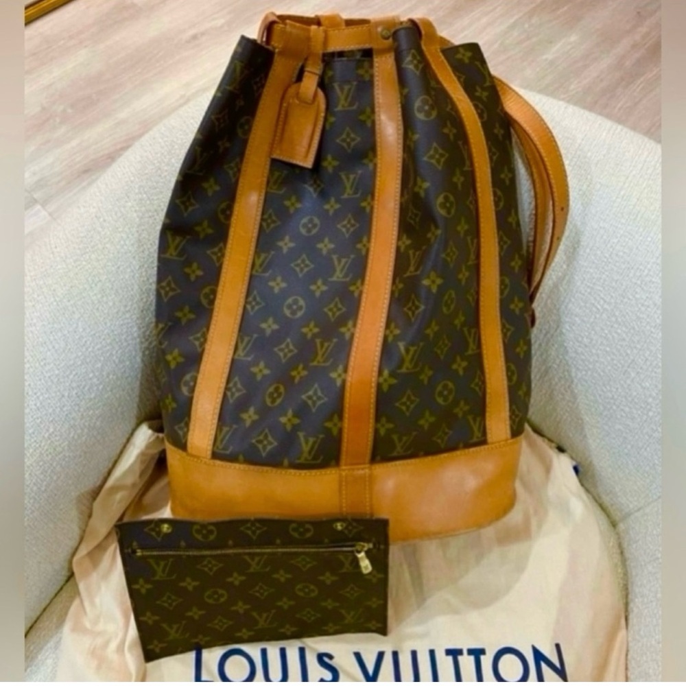 Authentic Louis Vuitton Randonnee GM backpack with pouch